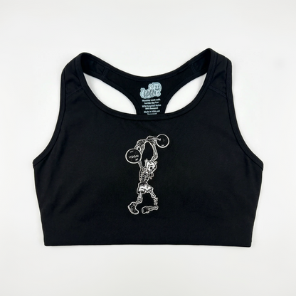 Black sports bra with skeleton lifting weights design on a white background